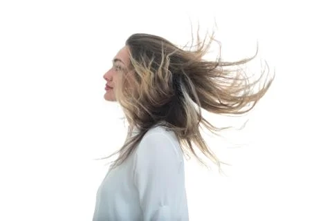 The girl with the developing hair on a white background Stockfoto's