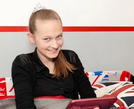 Girl with a digital tablet Stock Photos