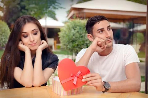 Girl Disappointed on Her Valentine Gift From Boyfriend 2 Stock Photos