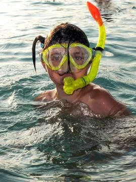 Girl in diving mask close up Stock Photos