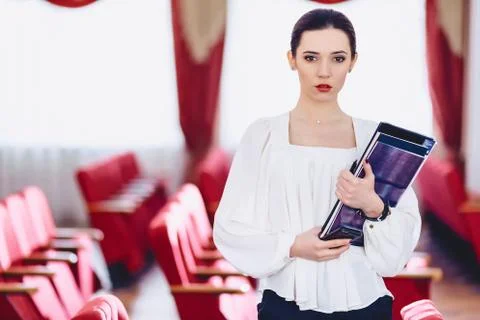 Girl with documents in backlight Stock Photos