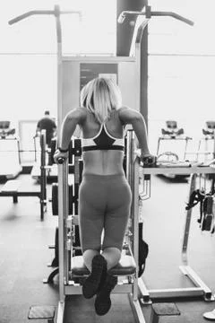 The girl does exercises on simulators Photos