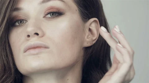 Girl does herself a make-up. Stock Footage 120796050