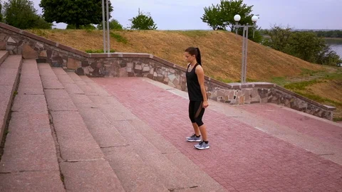 The girl does jumps, Stock Footage 110841932