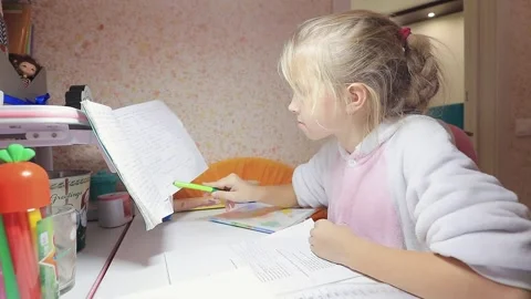 Girl does lessons Stock Footage 145216286