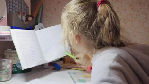 Girl does lessons Stock Footage 145246008