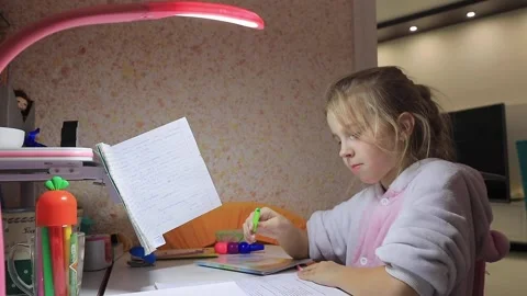 Girl does lessons Stock Footage 145387018