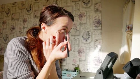 Girl does makeup at home Stock Footage 84108115