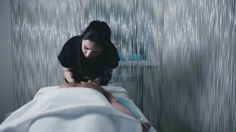 The girl does the relaxation of the back Video stock 76998344
