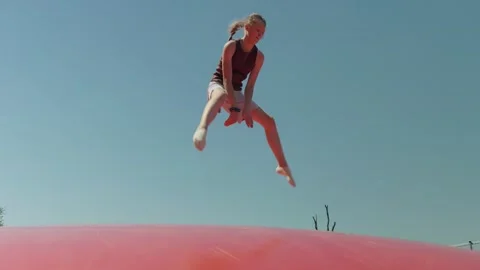 A Girl does the Splits while Jumping Video stock 344864774
