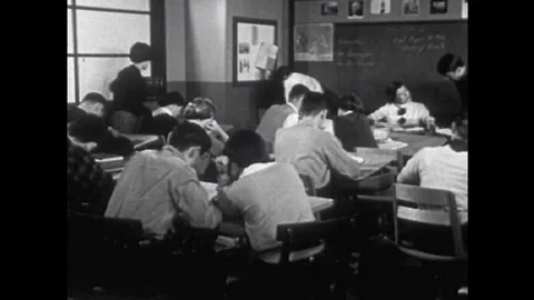 A girl doesnt know how to solve a problem in her class during the 1950s Video stock 102338316