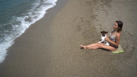 Girl with a dog does yoga Stock Footage 109470153