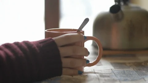 A girl doing breakfast with tea Stock Footage