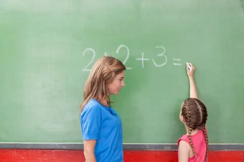 Girl doing an excercise of math 스톡 사진