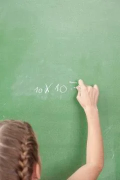 Girl doing an excercise of math 스톡 사진