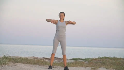 Girl doing exercise Stock Footage 135410856