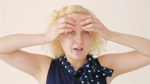 Girl Doing Exercise For the Forehead Stock Footage 64777219