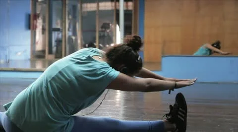 Girl doing Exercise in Gym Stock Footage 12295249