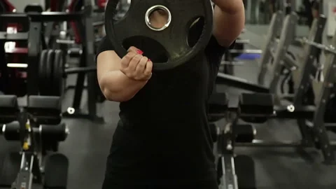 A girl doing an exercise for hands Stock Footage 93087338