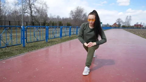 Girl doing exercises. Stock Footage 122380213
