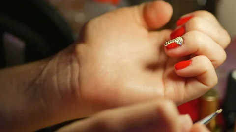 Girl doing her nails Stock Footage 88684781