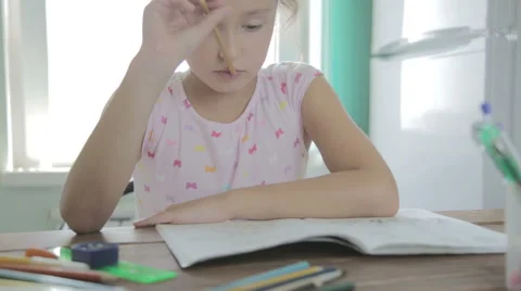Girl is doing homework for elementary school. 動画素材 52324287