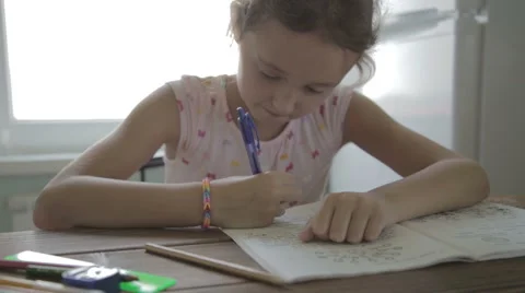 Girl is doing homework for elementary school. 動画素材 52324734