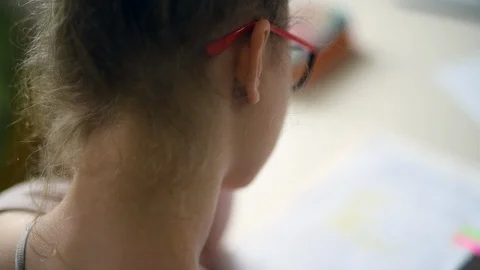 Girl doing homework. Stock Footage 88567546