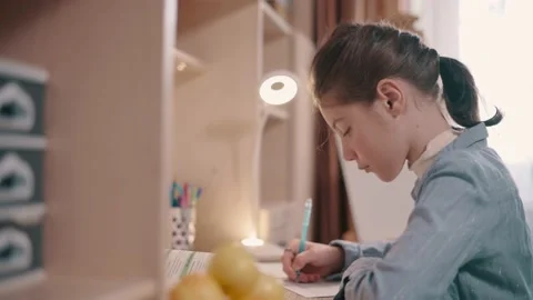 Girl doing homework. Stock Footage 165841922