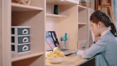Girl doing homework. Video stock 169823474
