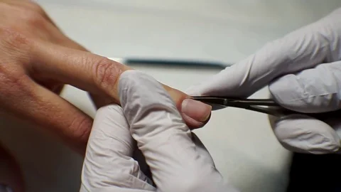 The girl is doing a manicure Stock Footage 74564053