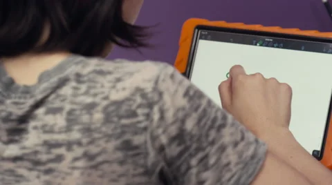 Girl doing mathematic on digital tablet Stock Footage 63861758