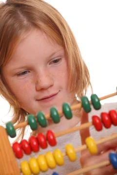Girl doing maths Stock Photos
