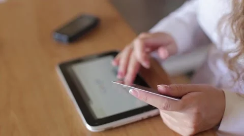 Girl doing online purchases using the tablet Stock Footage 51859577