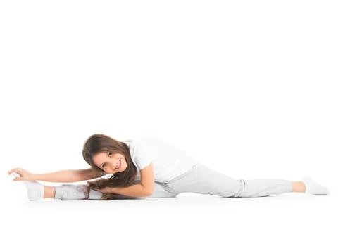 Girl doing split exercise Stock Photos