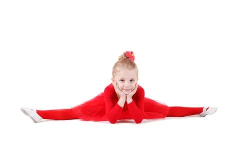 Girl doing split in red isolated on white Stock Photos