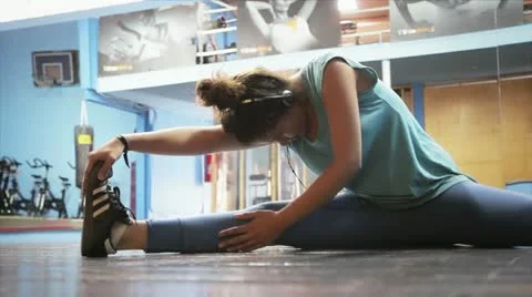 Girl doing stretching Stock Footage 12295285