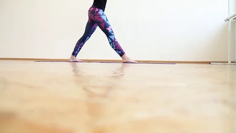 Girl doing yoga in the hall Stock Footage 83672955