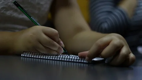 Girl drawing with pencil Stock Footage