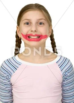 Girl with drawing smile clown Stock Photos