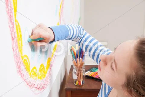 Girl Drawing On Wall