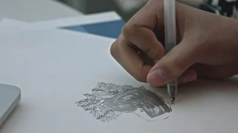 Girl Drawing on a white sheet of paper in her apartment Stock-Footage 59771000