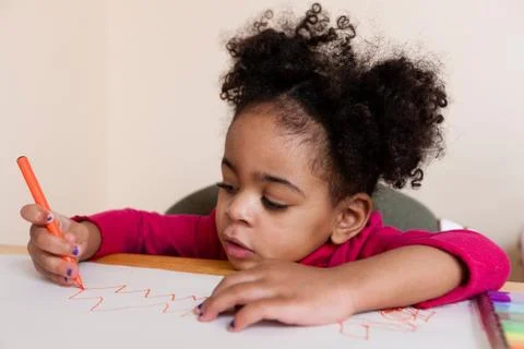 Girl drawing zig zag pattern 写真素材