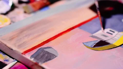 Girl draws with a brush on natural canvas Stock Footage 59086487