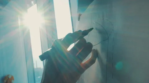 Girl draws on the easel in the rays of the setting sun Stock Footage 56311717