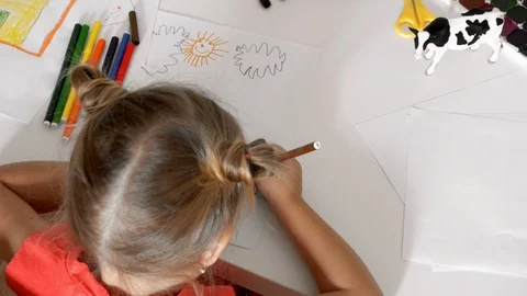 Girl draws at the table Stock Footage 102425205
