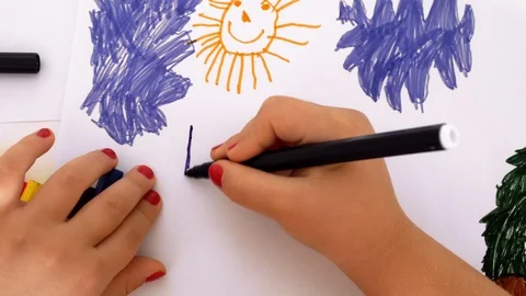 Girl draws at the table Stock Footage 102866969