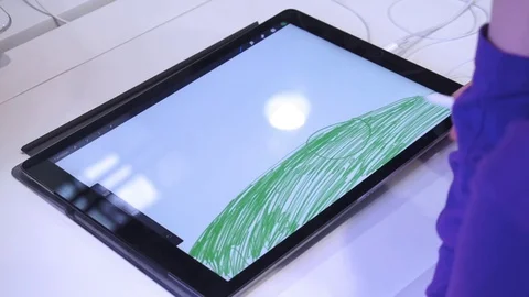 The girl draws on a tablet 動画素材 82584300