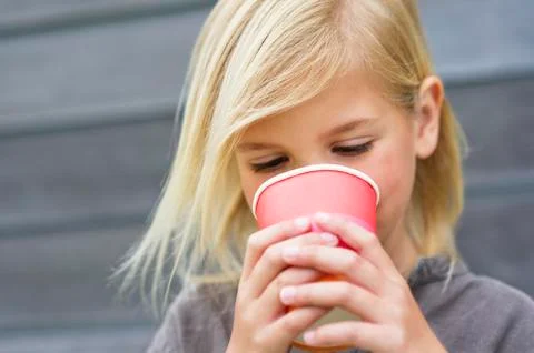 Girl drinking coffee Stock Photos