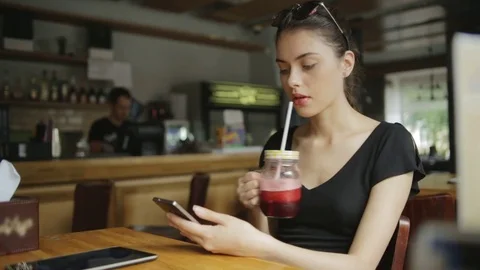 Girl drinking smoothie Stock Footage 73873004